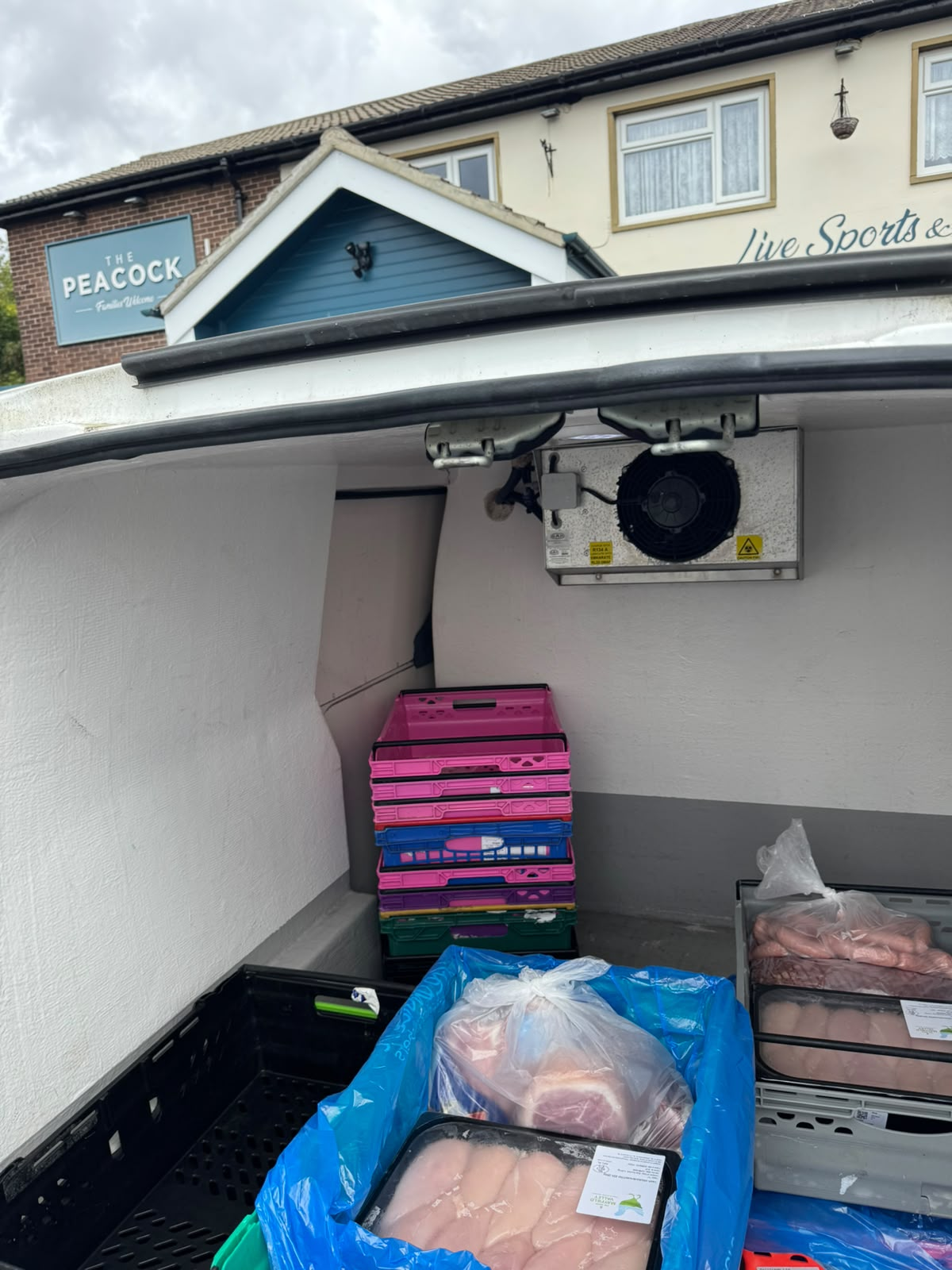 The refrigerated van loaded with orders ready for delivery